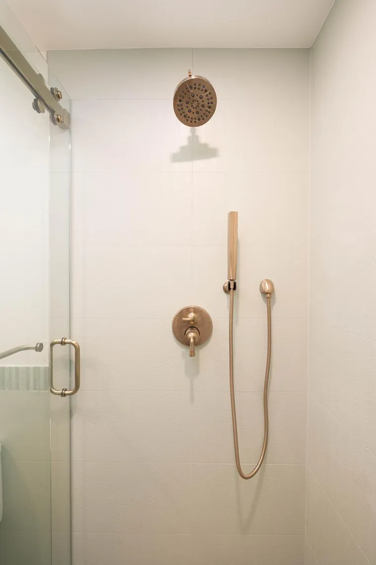 Brushed brass shower valve and handheld shower