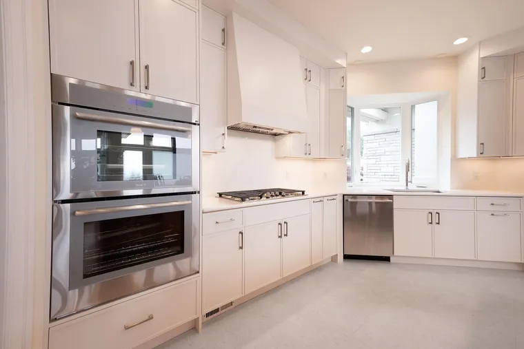 Double wall ovens and white cabinetry