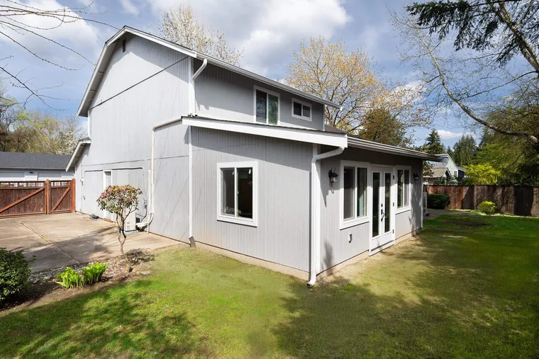 Single-story addition with French doors to the yard
